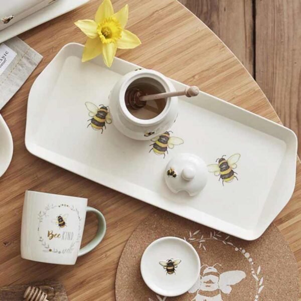 bumble bee bamboo tea tray with a honey pot standing on it