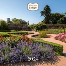 Front cover of the Lost Gardens of Heligan calendar 2024 with a summer garden image and blue sky