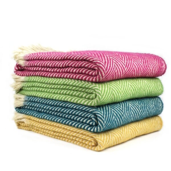 100% wool recycled throw 4 throws in a pile