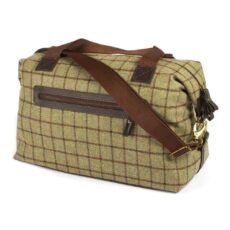 Tweed Weekender Bag in green check against a white background