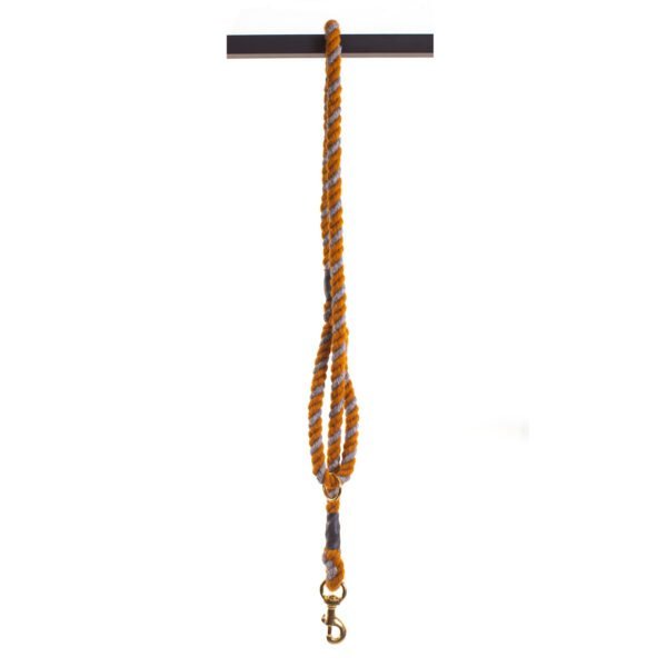 Mustard Yellow and Silver Grey Tweedmill wool rope dog lead hanging in half over a pole on a white background