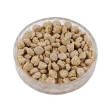 Swan and duck floating food in a clear dish on a white background