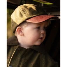 Kids Derby Tweed Hat worn by a child on a day out