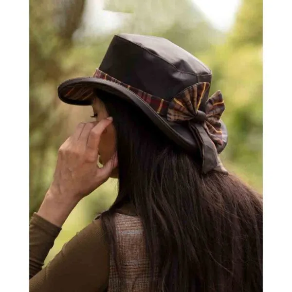 Woman with long dark hair wearing the Thelma Riding Style Hat back view