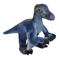 Natural History Museum's Velociraptor soft toy by The Puppet Company. Mostly blues and browns on the body On a white background facing right with yellow, white, and black embroidered eye